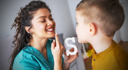 Speech and language therapists ‘should be based in schools’