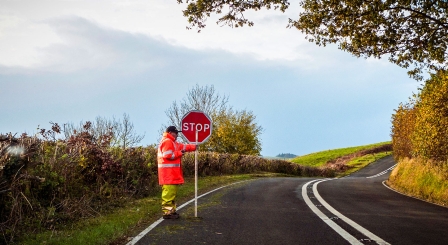 Man with stop sign