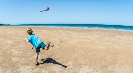 Boy throwing boomerang