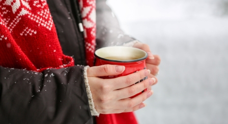 Child with cup of tea