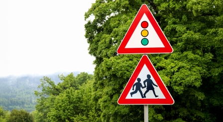 School sign with traffic light sign