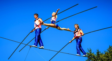 Three tightrope walkers