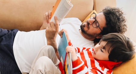 Parent and child reading together
