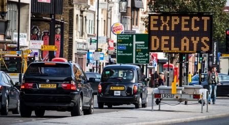 Traffic stopping at road sign
