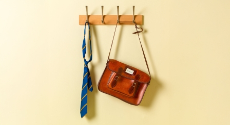 Tie and bag hanging from hooks
