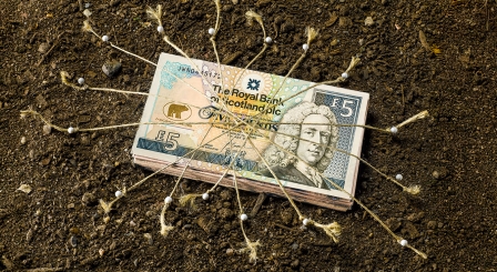 Scottish money tied to ground