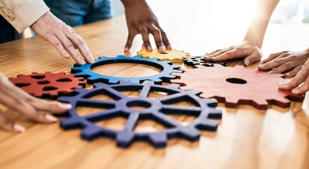 People making cogs work