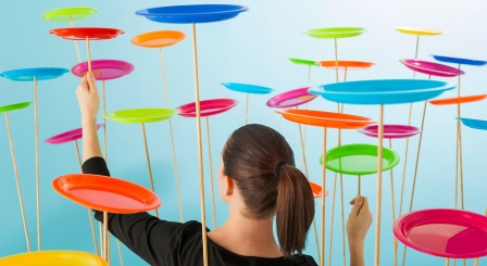 Woman spinning plates