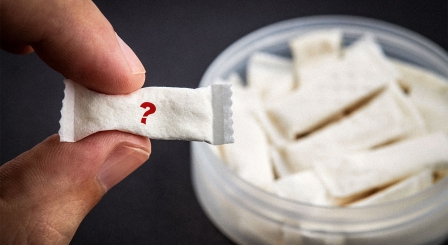 Nicotine pouche with question mark