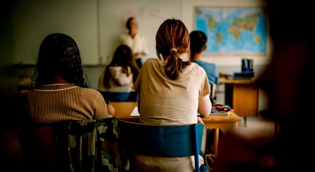 Secondary school teacher in classroom