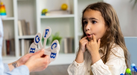 Child in speech therapy