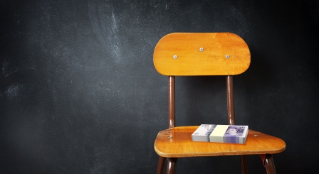 Wad of money on chair