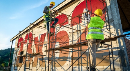 Numbers on side of building with scaffold