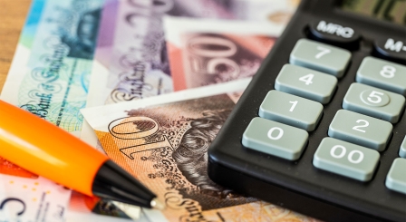 money a calculator and a pen