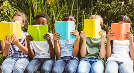 Children on bench reading