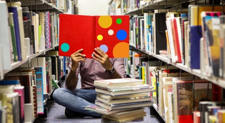 Reading books in library