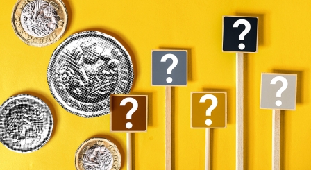 Question marks and coins