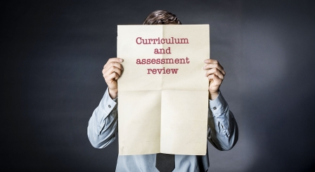 Man holding up paper