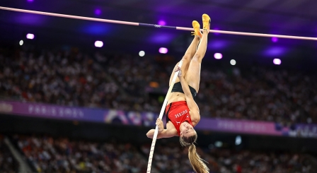 Pole vaulter jumping bar