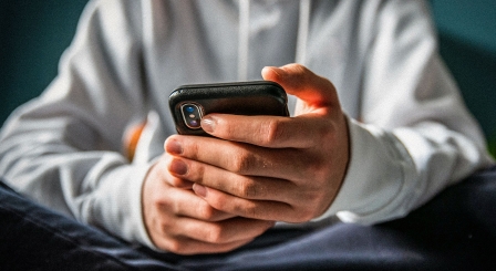 Teenage boy with mobile phone