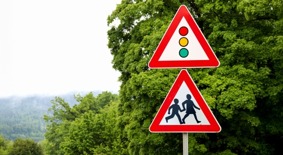 School sign with traffic light sign