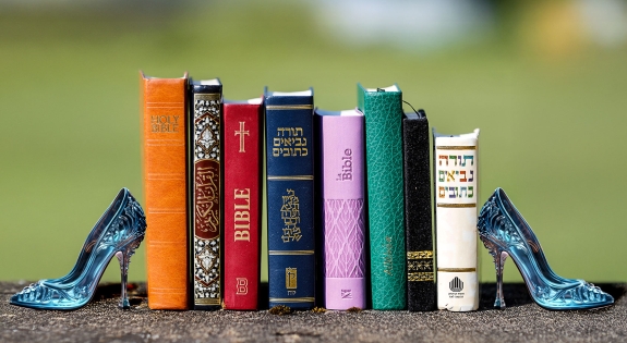 Religious books with glass slipper book ends