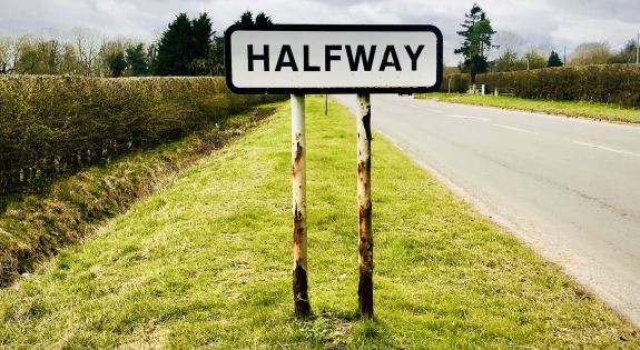 Road sign Halfway
