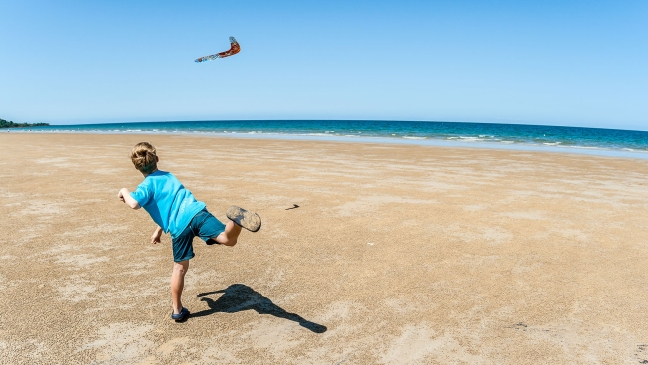 Boy throwing boomerang