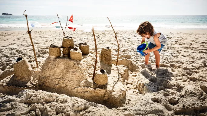 Sand learning to build sandcastles