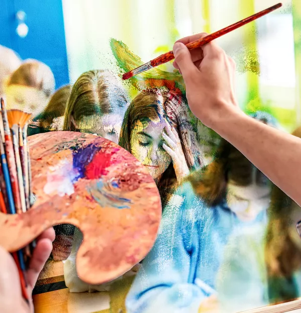 Artist painting picture of classroom