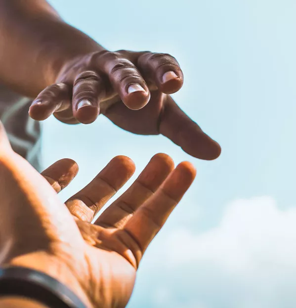 Hand reaching out to help