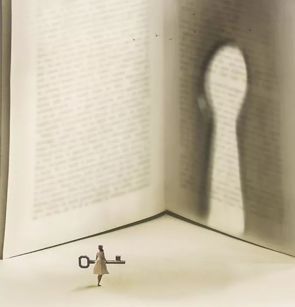 Girl with key to a book