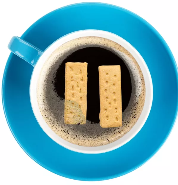 Biscuits In A Cup Of Tea That Make Up The 'pause' Symbol – Summer Holiday Teachers Relax