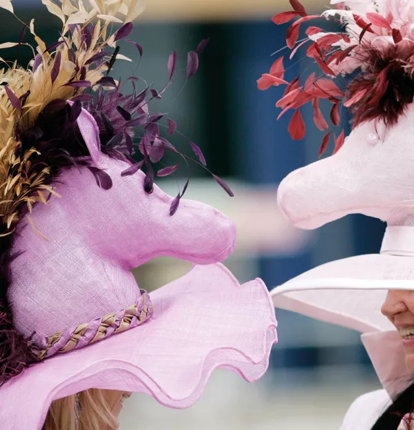 Two Women Wearing Similar Horse-shaped Hats – Teacher Mimicry Habits