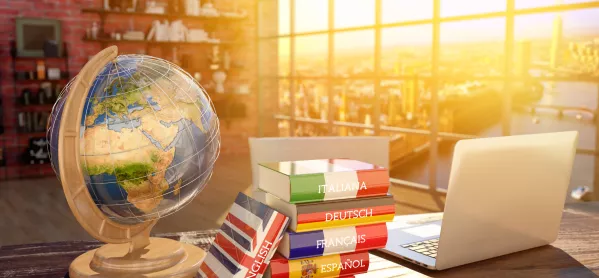 language books and globe in the sun on a table 