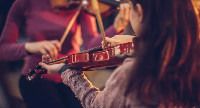 child playing violin