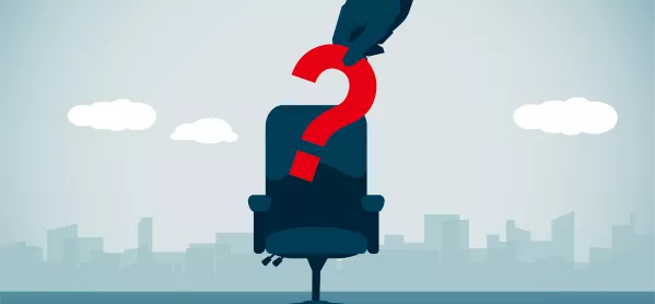 image of chair with hand placing red question mark on the seat