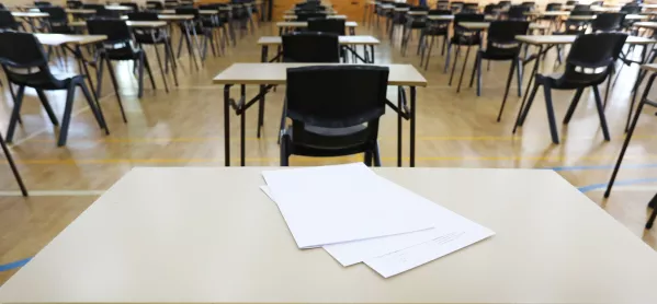 Views of exam tables and papers set up in an examination room