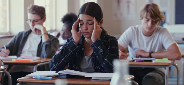 Shot of a student struggling with schoolwork in a classroom stock photo