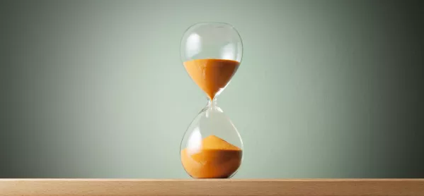 Hourglass with orange sand 