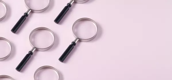 Magnifying Glasses on pink background