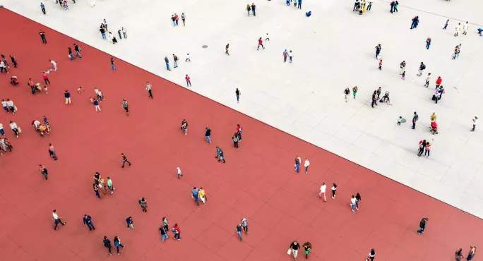 Crowds standing on two separated zones stock photo