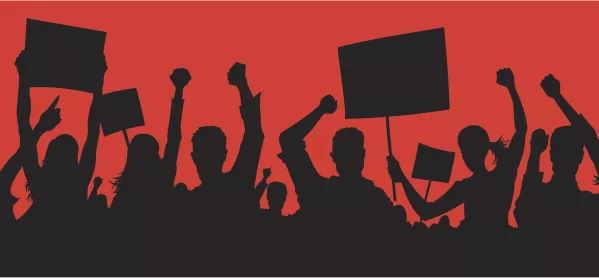 Angry protesters silhouette on red background