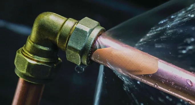 A sticking plaster on a leaking pipe