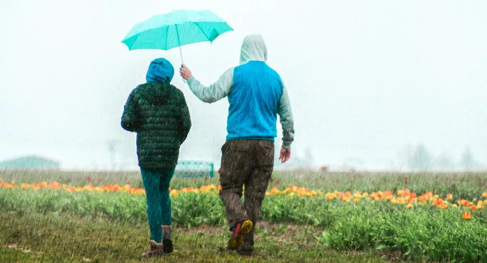 Holding umbrella