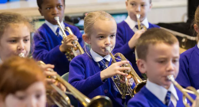 Children playing the trumpet