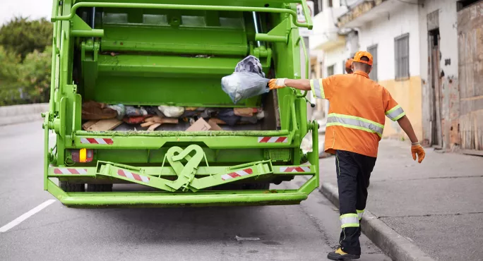 Bin van being loaded