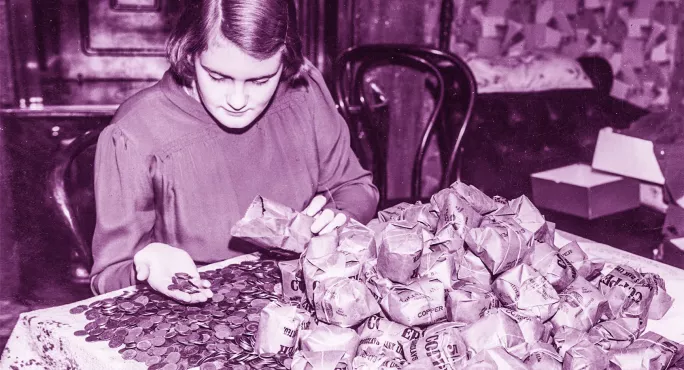 A woman counting coins