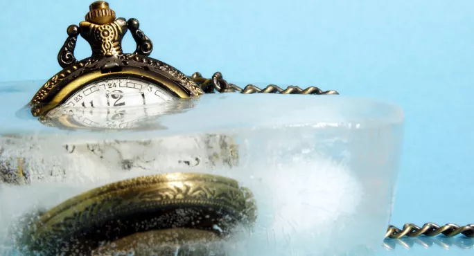 Pocket watch encased in ice