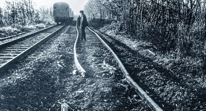 Man standing on derailment track